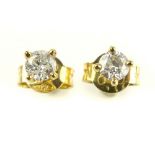 Pair of 18ct yellow gold diamond ear studs, claw set, 0.