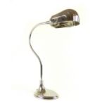 A nickel plated Art Deco style desk lamp with shell shape shade,