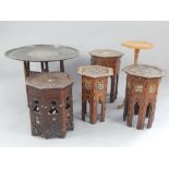 A collection of Middle Eastern occasional tables, carved and inlaid with bone and mother of pearl