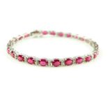 18ct white gold, ruby and diamond tennis / link bracelet, rubies 11.58ct, diamonds 0.