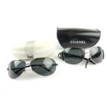 Pair of Chanel sunglasses, aviator style, and a pair of Dolce & Gabbana black sunglasses