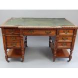 Edwardian walnut breakfront pedestal desk by Jas Shoolbred & Co,