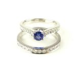 18ct white gold, diamond and tanzanite solitaire ring, with matching half eternity diamond ring,