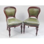 Pair of Victorian mahogany chairs, buckle back, later green leather upholstery, bowfront seat,