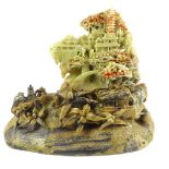 Signed Chinese soapstone sculpture, a hilltop village with pagoda,