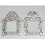 Pair of Italian style mirrors, silvered accanthus leaf decorative frames, 57x 45cm.