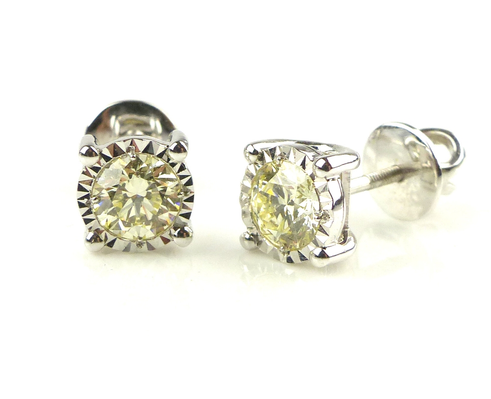 Pair of 18ct white gold illusion set diamond studs, 1. - Image 3 of 3