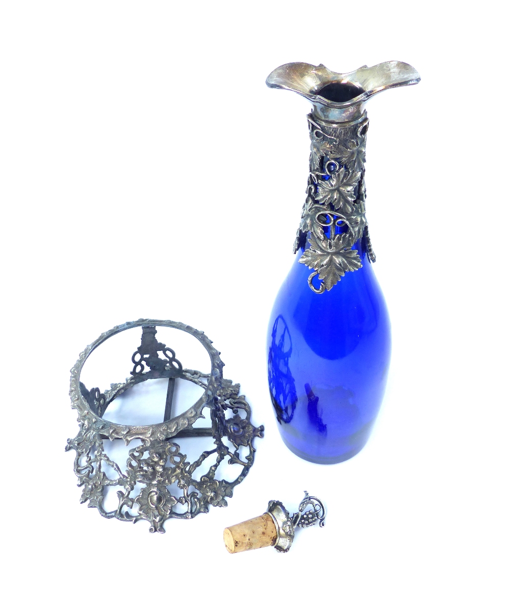 A blue glass and white metal mounted claret jug, stopper and stand, 36cm h - Image 2 of 2