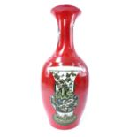 A Chinese porcelain ovoid vase with powder burnt earth ground and panels of the potters art in the