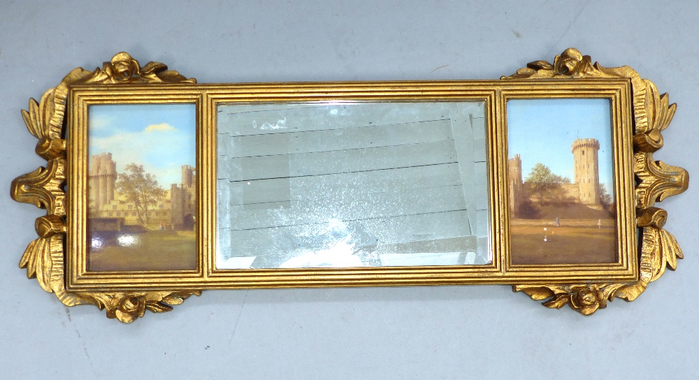 A gilt framed three panel overmantle mirror.
