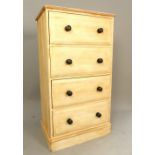 Painted pine chest of drawers, the rectangular moulded top above an arrangement of four drawers,