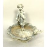 Lead bird bath, modelled with a cherub seated above a scallop shell with a dove to the rim,