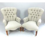 Pair of Herringbone upholstered study chairs, buttonback, turned legs and brass casters.