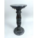 Black marble pedestal, circular top,