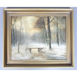 In the manner of Louis Apol, snow covered forest, oil on canvas,