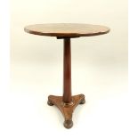 19th C mahogany wine table, circular top, spreading octagonal stem, tripartite base, bun feet, 54.