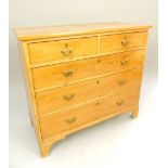 Pine chest, early 20th C, two over three graduated drawers, brass handles and escutcheons,