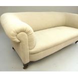 Chesterfield style upholstered sofa, covered in oatmeal coloured fabric,