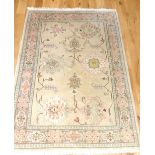 Turkish Milas rug, spandrel design over cream ground,