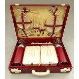 1950s vintage picnic set by Brexton, for four place settings including two flasks,