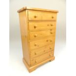 Narrow pine chest of six drawers, bun handles 20th c, 103x 65.