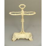 Early 20th C cast iron stick stand of Art Nouveau form, leaf and scroll decoration,