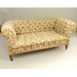 Chesterfield sofa, double seat, buttonback roll arms, tapering box legs, c 1900,