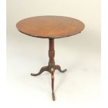 19th C mahogany lamp table, circular top, turned stem, tripartite base, pad feet, 56.