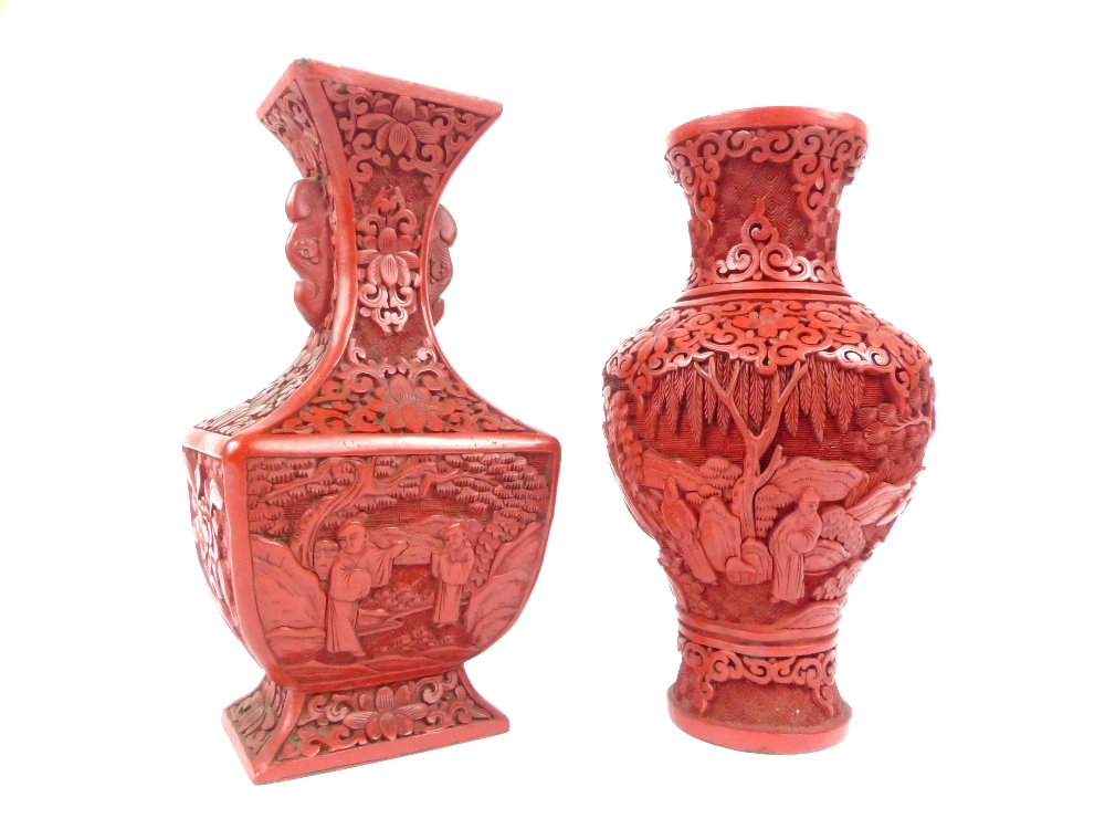 Two red cinnabar lacquer vases decorated with figures, scrolling flowers and trees,