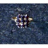 An antique garnet ring in yellow gold,