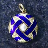 An antique pearl and enamel lover's locket in high carat yellow gold,