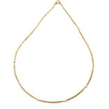 An antique yellow gold and seed pearl necklace the cable chain punctuated with seed pearls.