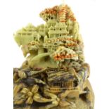 Signed Chinese soapstone sculpture, a hilltop village with pagoda,