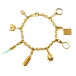 Cartier, A vintage charm bracelet, in 18ct yellow gold and enamel.