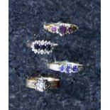 Four antique dress rings in yellow metal with mixed stones and seed pearls. Gross weight 7.9g.