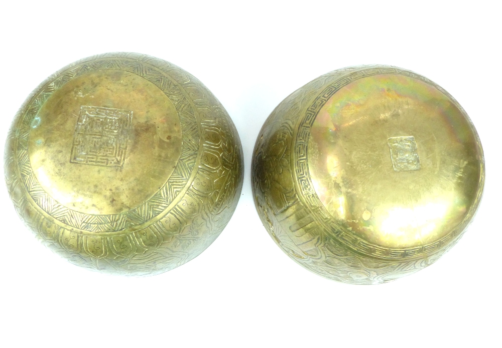 Pair of heavy Chinese brass bowls decorated with warriors, character marks to underside, - Image 2 of 2