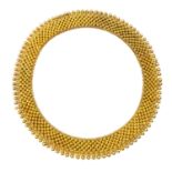 An antique Etruscan revival collar necklace in high carat yellow gold, each link of the six link