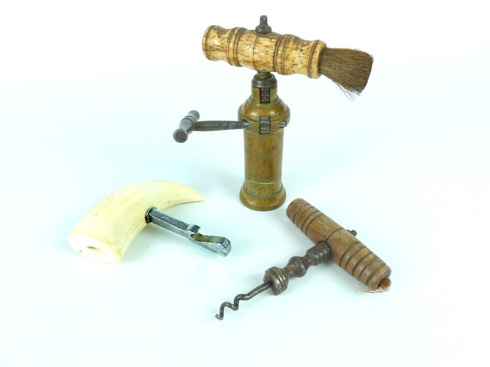 19th century King's patent brass ratchet corkscrew, ivory handle with brush, lion and unicorn