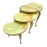 Nest of 3 kidney shape tables onyx tops, brass scroll legs, c 1970, largest 57 cm w.