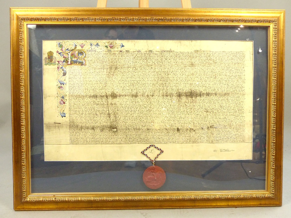 A framed facsimile of an ancient illuminated manuscript with a great knight seal, 48x 85cm, framed.