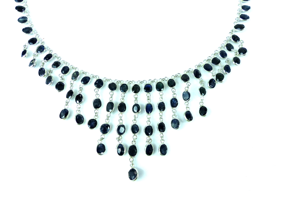 Sapphire fringe necklace, the oval cut stones mounted to a silver chain, 15g - Image 3 of 4