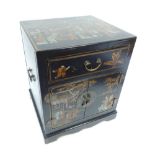 Chinese cabinet, black with oriental court and trader decoration, drawer over cupboard, 61 x 51cm
