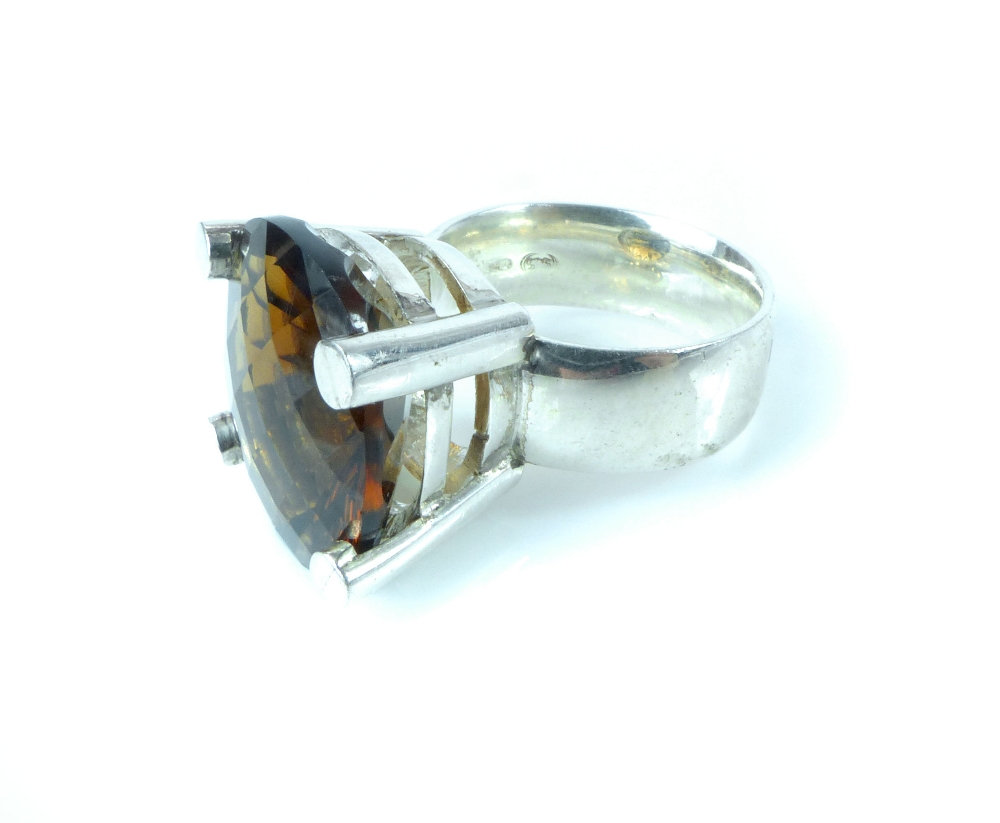 Smoky quartz dress ring, the deep claw setting on a silver band, 13g. - Image 5 of 6