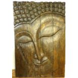 Large carved panel, a study of the head of wooden Buddha. 180x 120cm