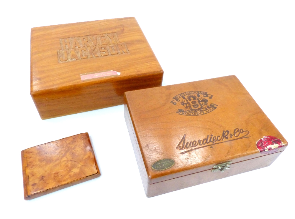 Two vintage cigar boxes, Suerdieck & Co Brazil and Harvey Jackson Tabacalera Philippines, and a burr