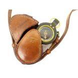 World War I officer's compass, in stamped matching leather pouch, stamped makers Stafford 1917,