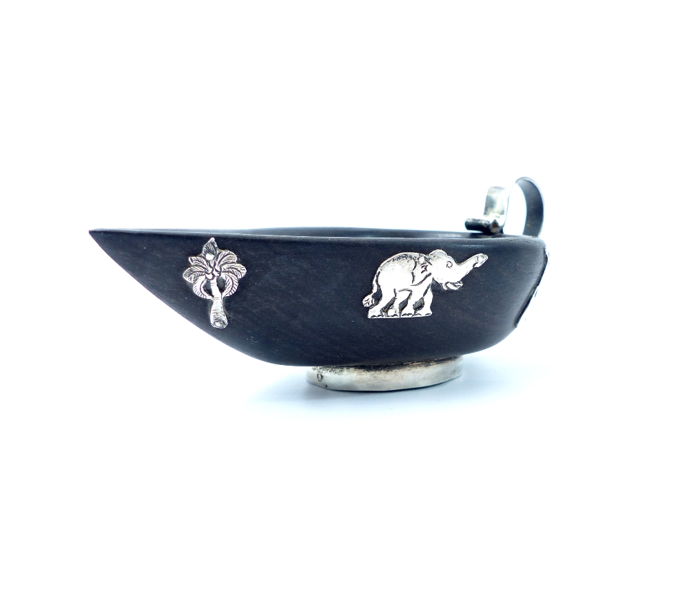 Indian silver & ebony sauce boat with silver handle & base decorated with silver elephants