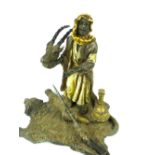 Bergman, Austrian cold painted bronze, study of an Arab trader, holding a deer with vases, musket at