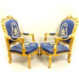 Pair of Persian design elbow chairs, gilt rococo frames with scroll and floral decoration,