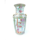Early 20th century famille rose porcelain vase, decorated with figural panels within gilt and floral